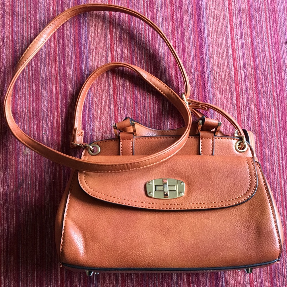 Simply Noelle orange purse with buckle and zip